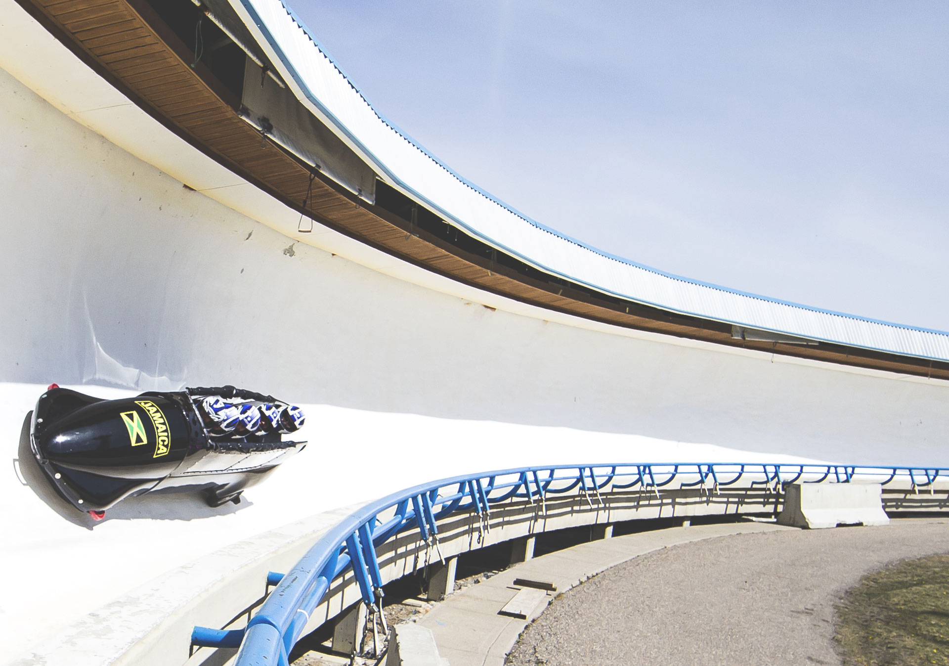 Experience the rush of the summer bobsleigh at WinSport.