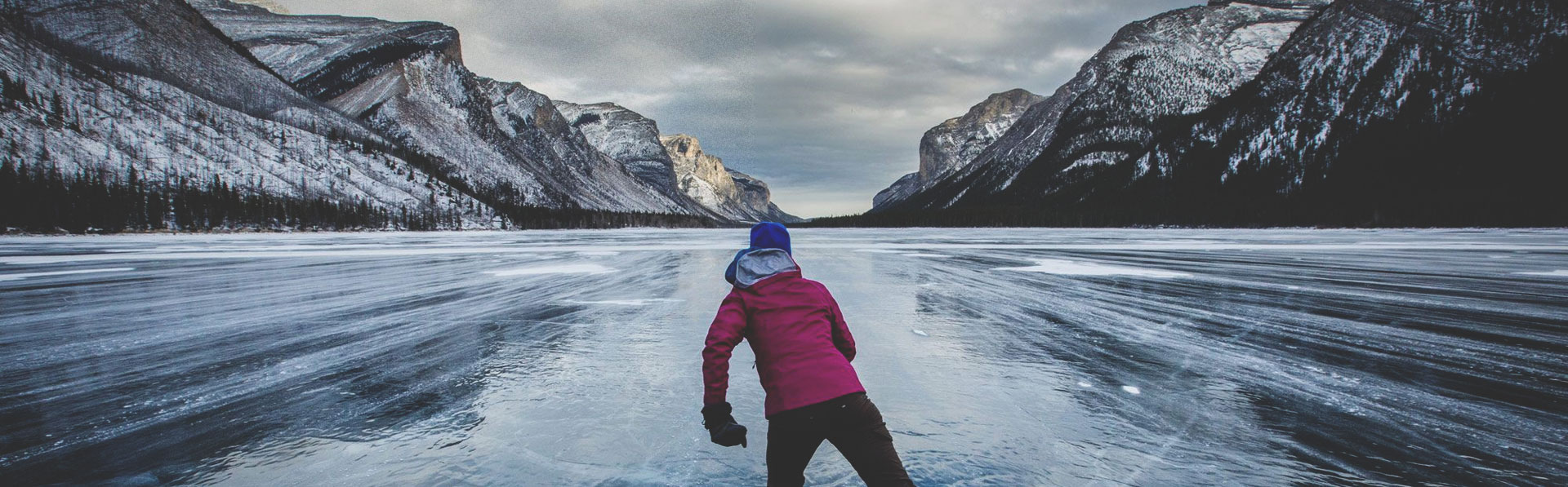 Woman skating on Lake Louise in winter