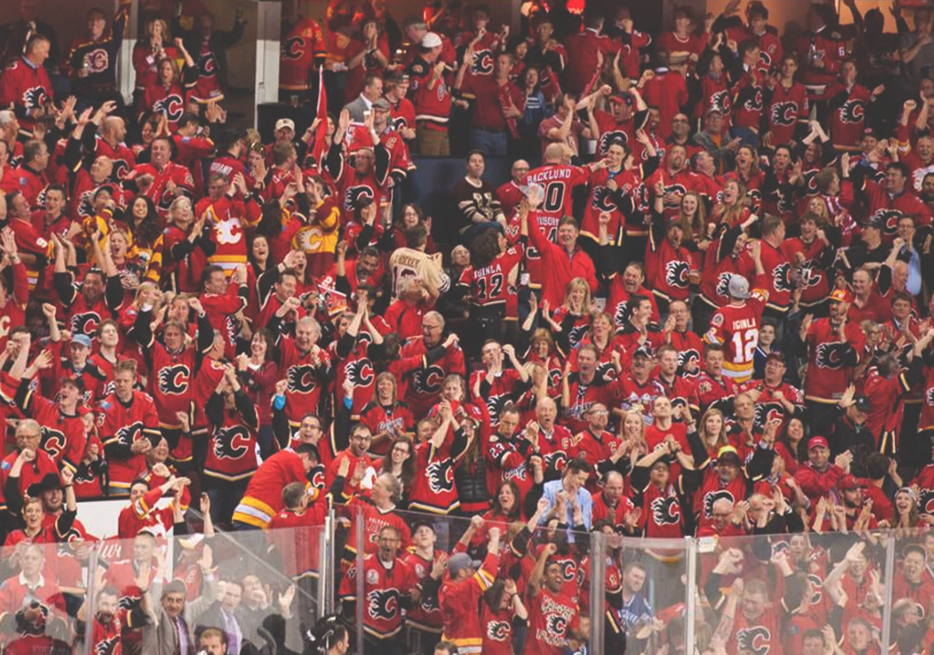 Calgary Flames NHL Fans cheering wildly in the stands