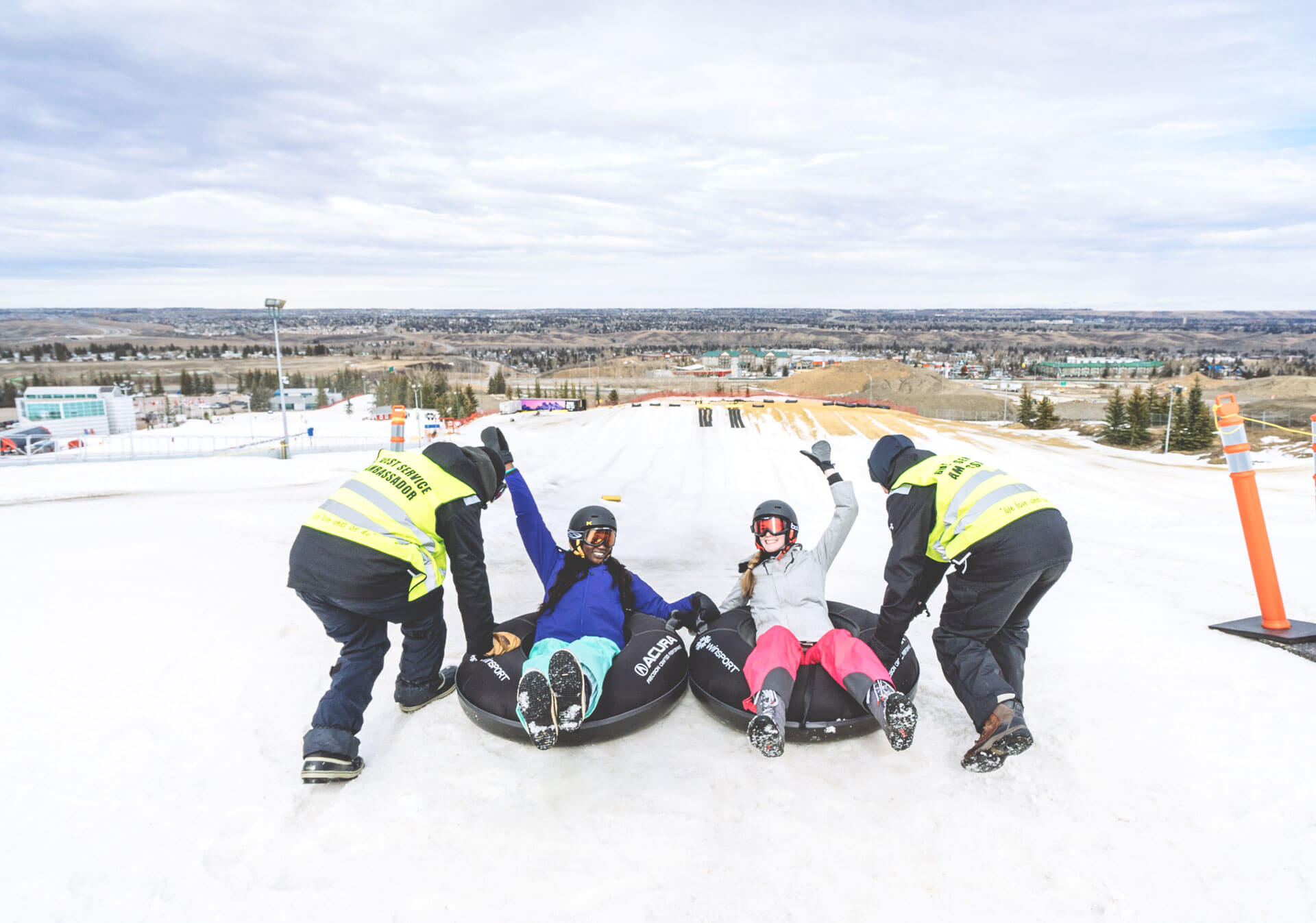 Go tubing at the WinSport Acura Tube Park (Photo credit: Travel Alberta/Steve Tuchiwsky).