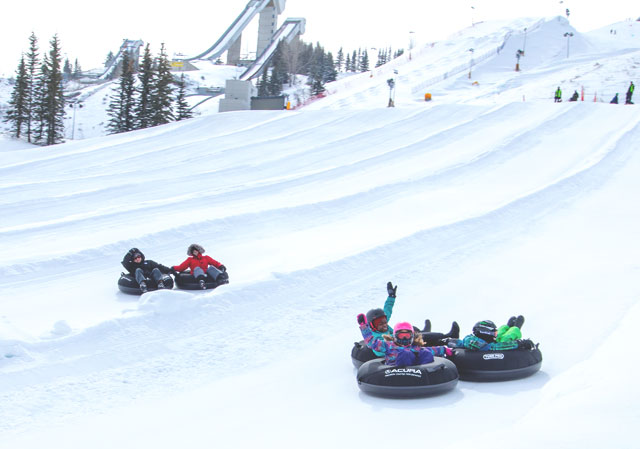 Go tubing at the WinSport Tube Park