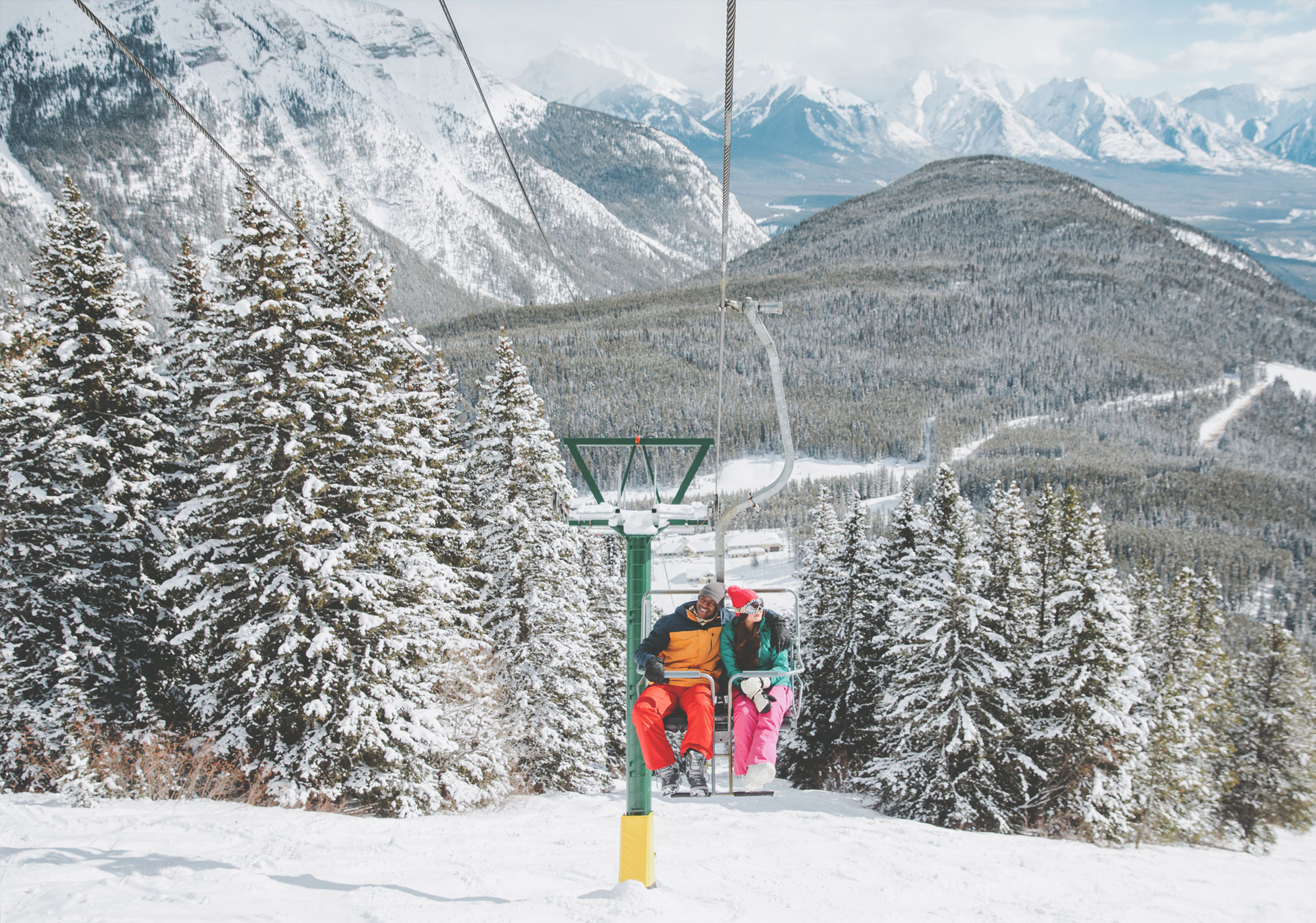 Riding the chairlift at Mount Norquay Ski Resort (Photo credit: Travel Alberta/Mike Seehagel).