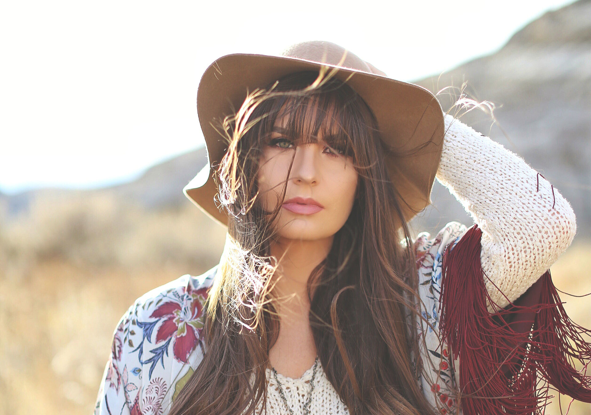 Flat brimmed or floppy hats will help you look the part at the Calgary Stampede.