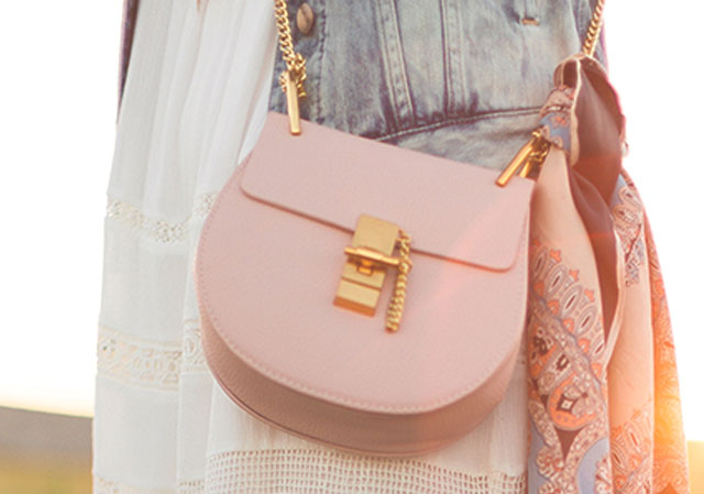Add a feminine pop to your Western inspired outfit with a colourful bag.