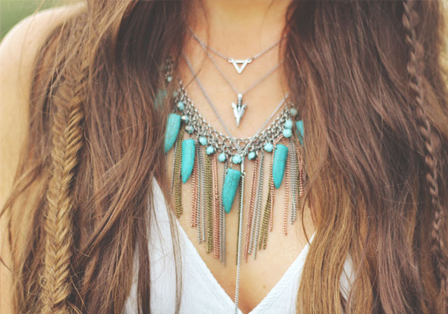 Layer vintage turquoise with a more traditional lariat-style necklace.