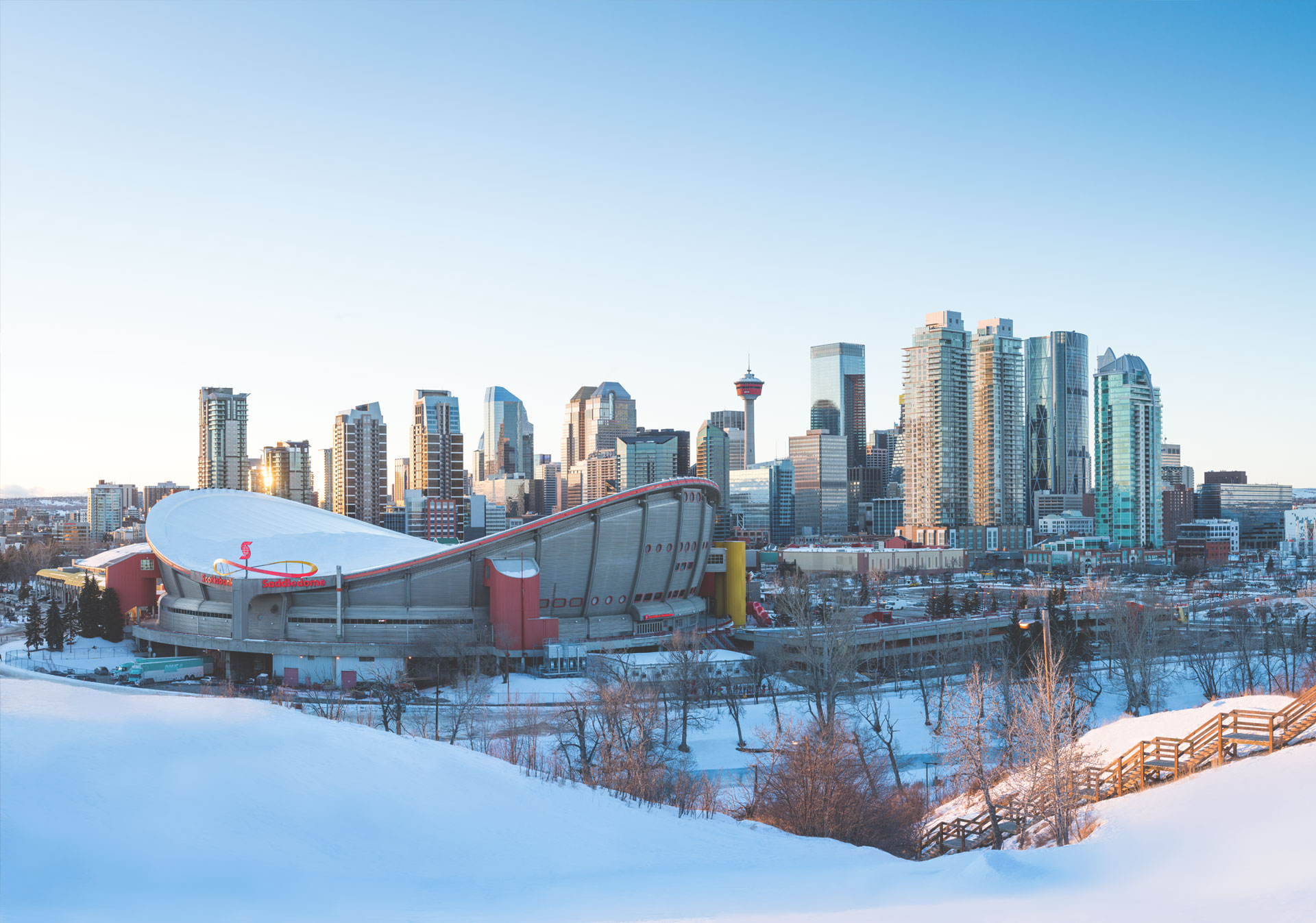 Winter skyline view of the Scotia Saddledome and downtown Calgary