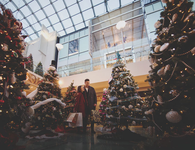 Christmas shopping is the CORE Calgary, surrounded by decorated Christmas trees
