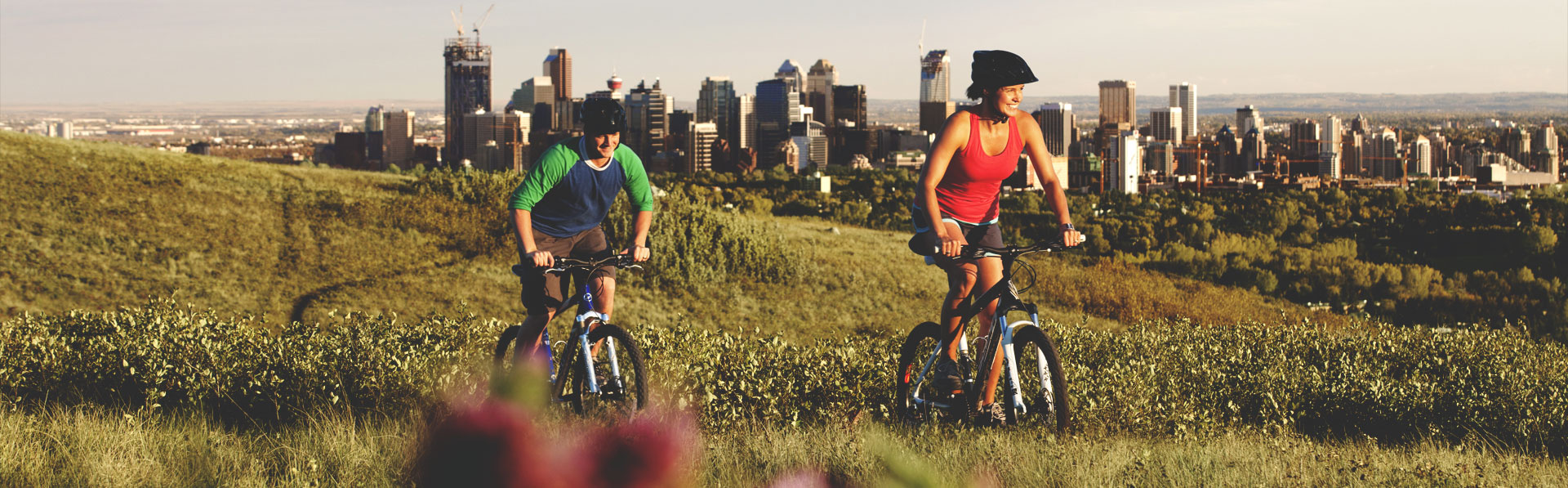 Biking on Nose Hill with the Calgary skyline in the background
