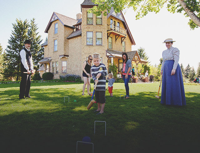 family playing croquet at Heritage Park
