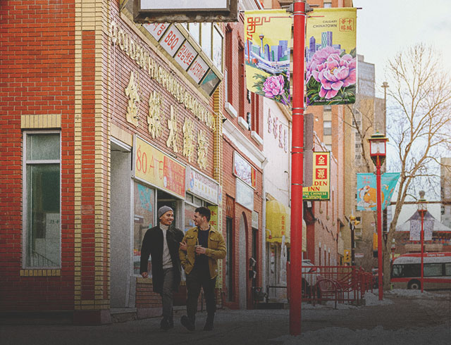 Couple walking through Calgary's Chinatown in winter