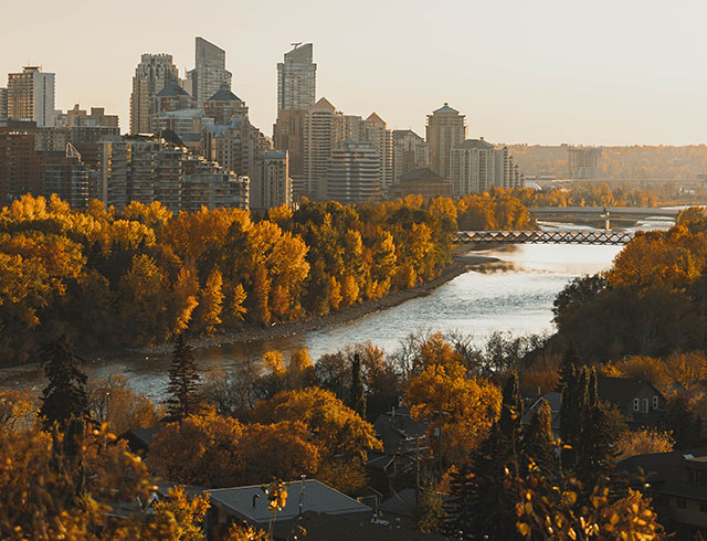 Aerial overlooking Sunnyside during autumn with the skyline and sunset in the background