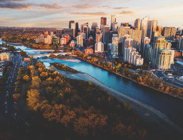 aerial photo of Calgary's skyline facing east during autumn