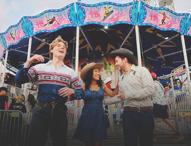three friends exploring the Calgary Stampede midway