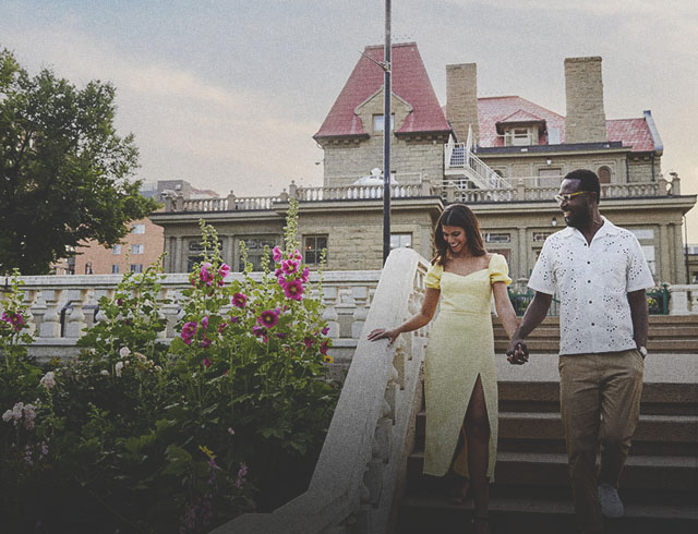 couple walking in the beaulieu garden at the Lougheed House