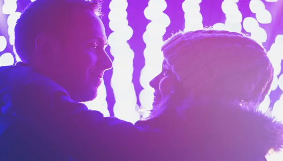 Man and women on a date at Calgary Zoo Lights