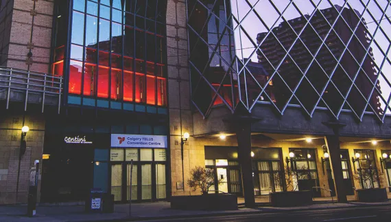 Exterior of the Calgary Telus Convention Centre downtown at dusk