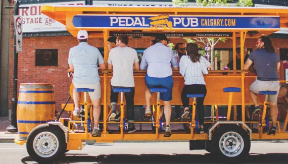 Team on a peddle pub tour