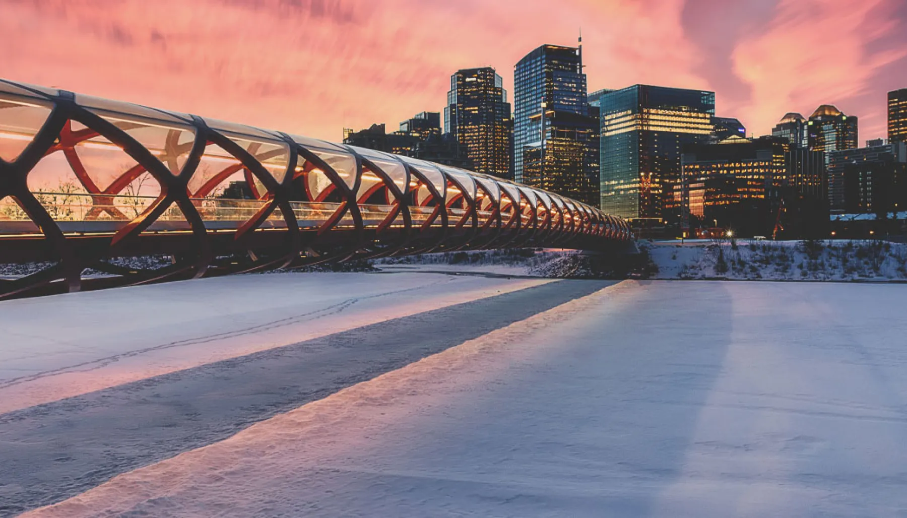 The Peace Bridge in Calgary over the frozen Bow River during Winter 