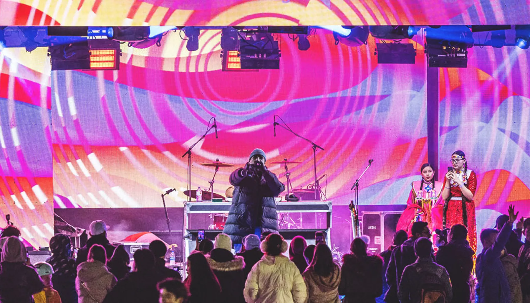 crowd enjoys an outdoor concert performance during Chinook Blast