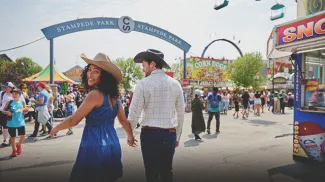a couple enjoying Calgary Stampede