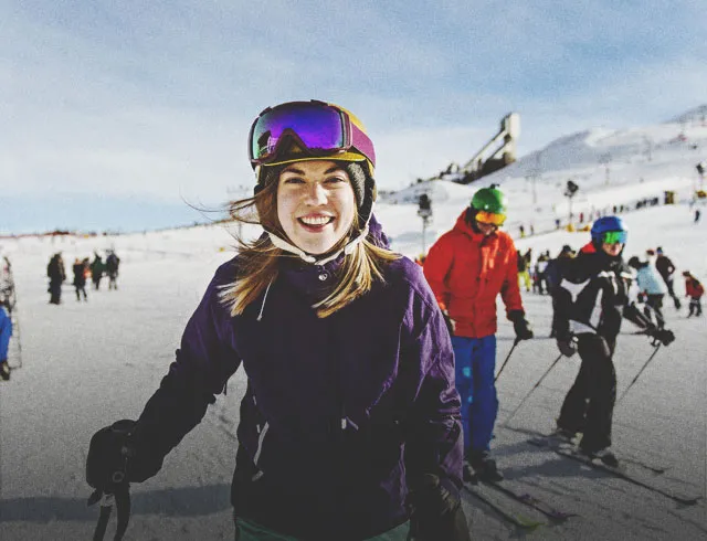 girl skiing with her friends at Calgary's WinSport ski hill