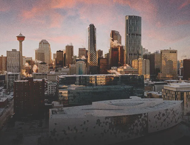 Calgary skyline during a pink winter sunset