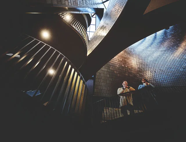 couple standing inside Studio Bell 