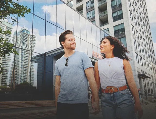 couple walking hand in hand in the Beltline