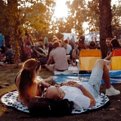 couple enjoying the Calgary Folk Music Festival in Prince's Island Park