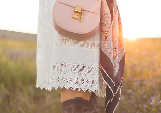 Short dresses are ideal for showing off tall cowboy-inspired boots.