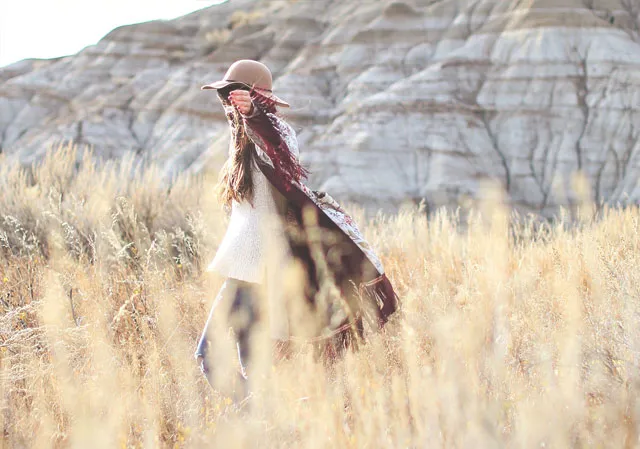 Channel your inner cowboy by adding scarves and shawls to your outfit.