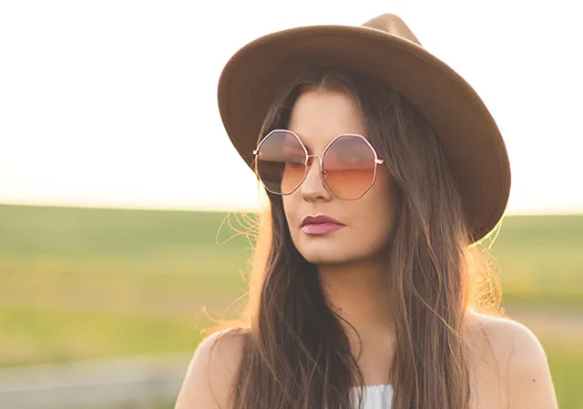 Hexagonal, rose-tinted sunnies are the perfect finishing touch to this bohemian look.