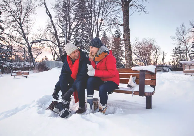Skate tying at Bowness Park Lagoon (Photo credit: Travel Alberta/Roth & Ramberg).