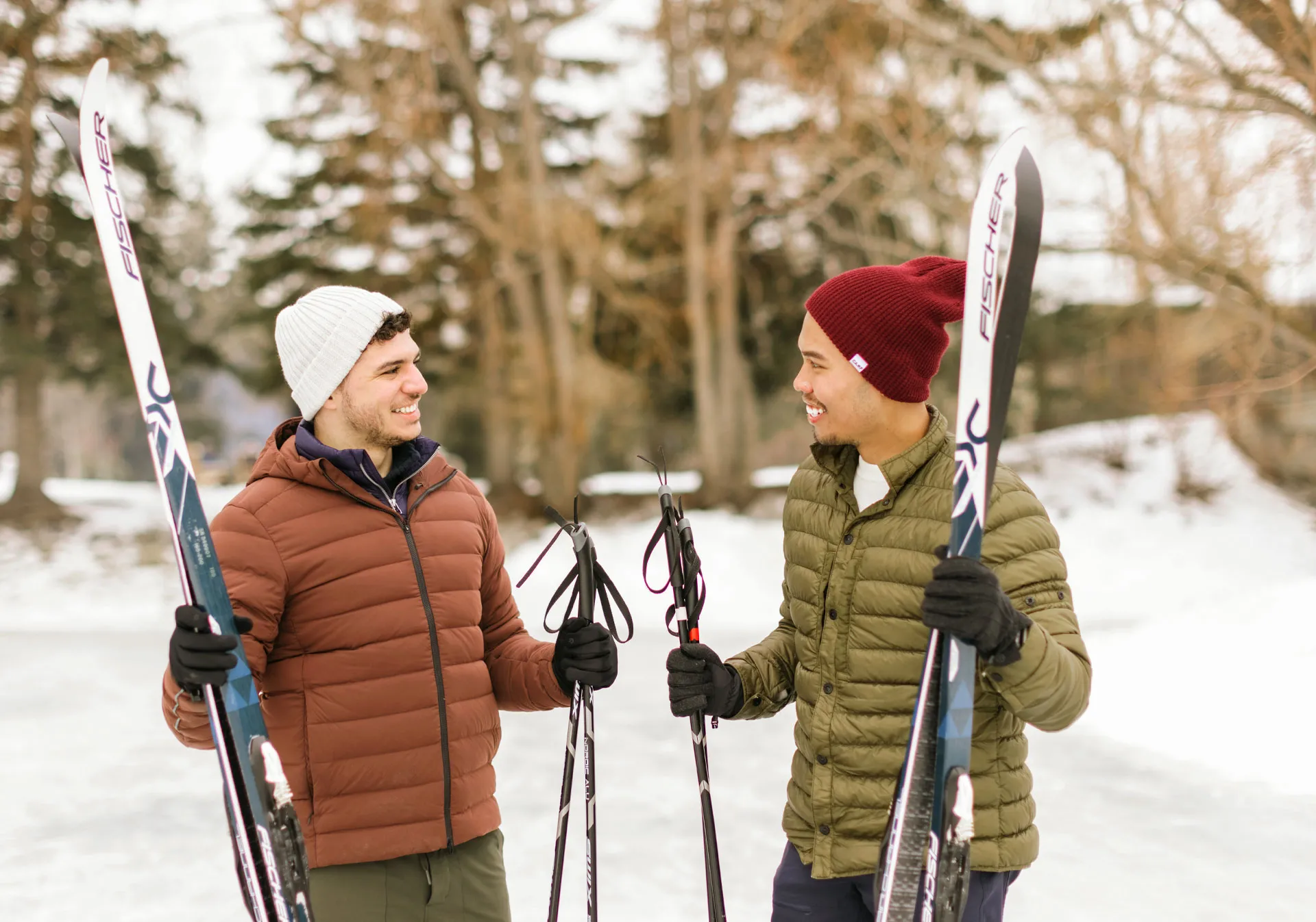 Two men getting ready to go cross-country skiing in Bowness Park 