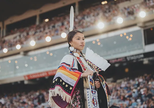 Indigenous Performer in traditional dress