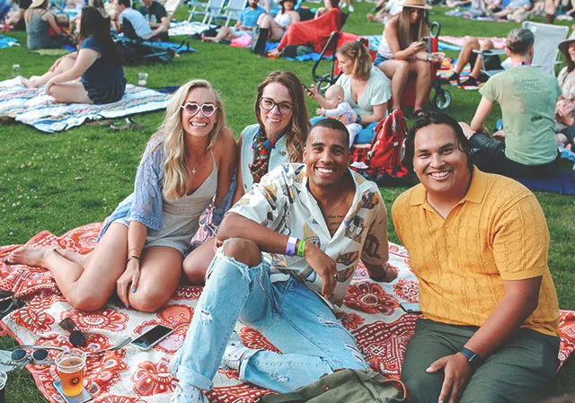 Group of friends enjoying the Calgary Folk Music Festival