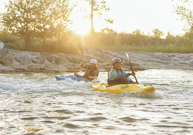 Two people kayaking through Harvie Passage