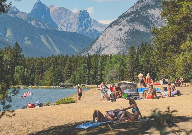 groups enjoying the beach at Johnson Lake