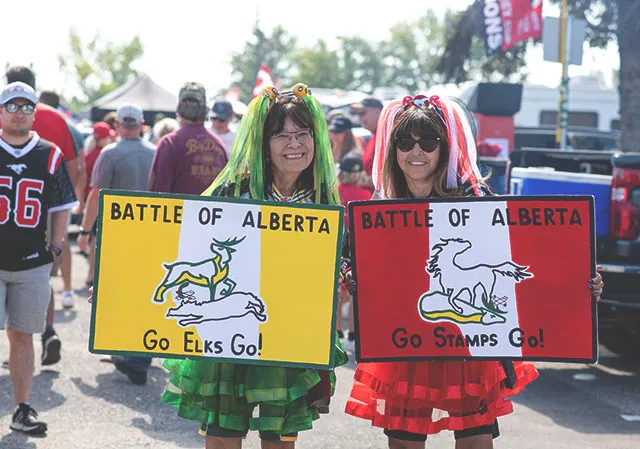 Rival fans enjoying a CFL game