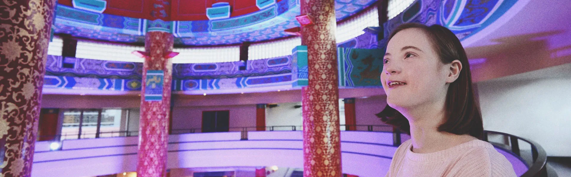girl admiring the interior of the Chinese Cultural Centre