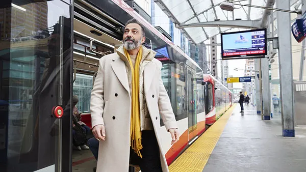 Man using Calgary's LRT