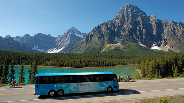 Tour Bus driving through the mountains