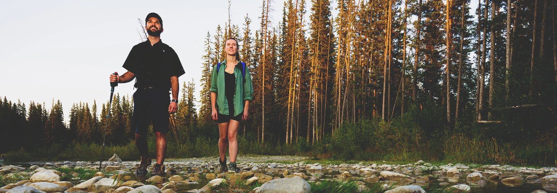 two people hiking in Fish Creek Provincial Park