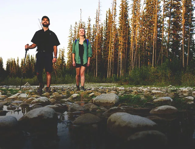 two people hiking in Fish Creek Provincial Park