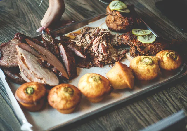 tray of BBQ and cornbread at Comery Block