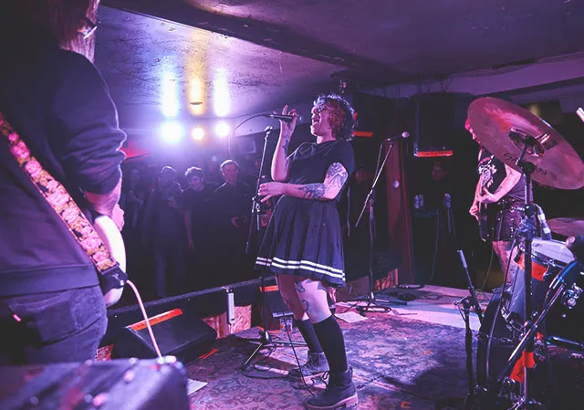 band performing onstage at The Palomino basement