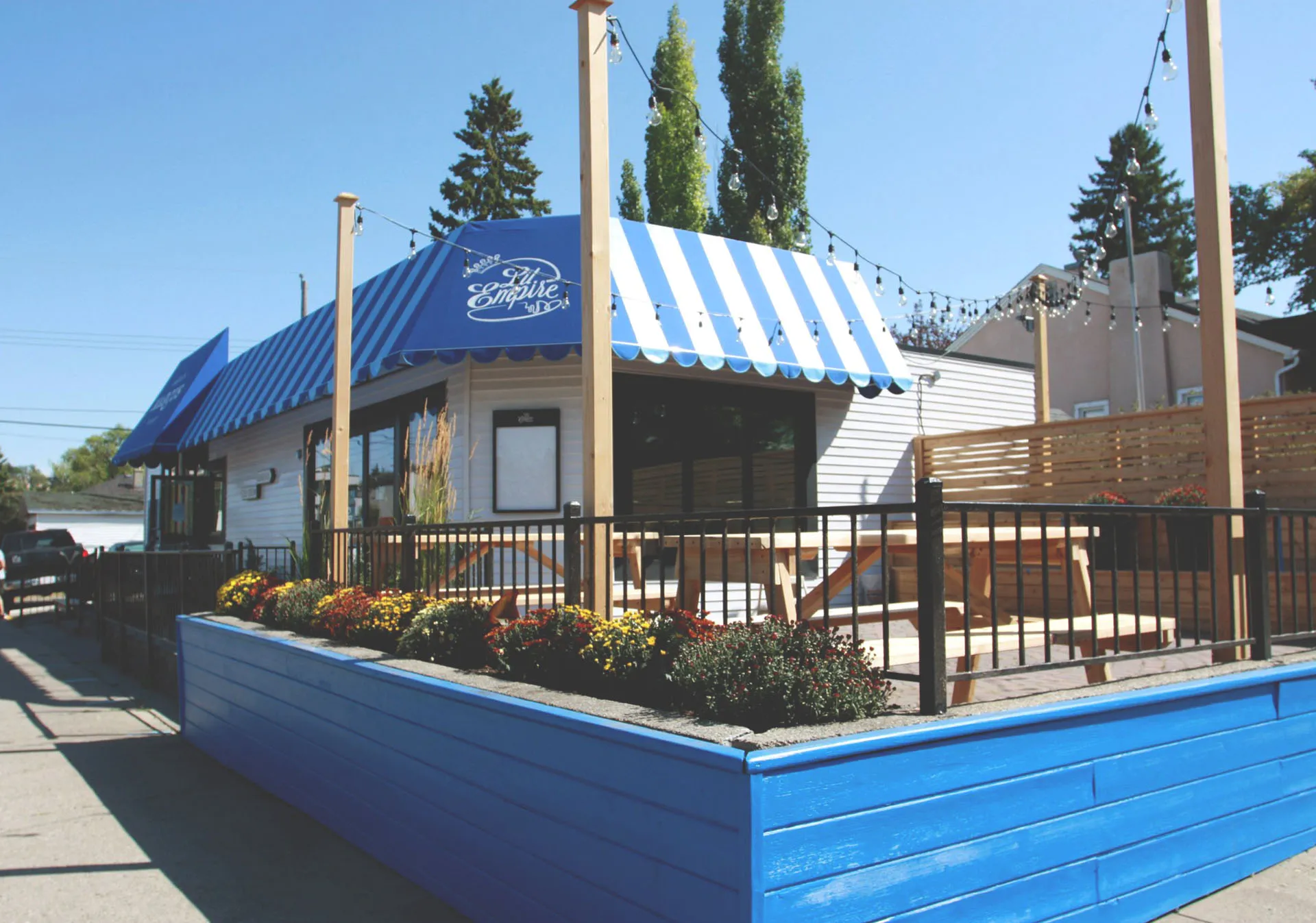 exterior of Made by Marcus and Lil Empire burgers in Bridgeland during summer