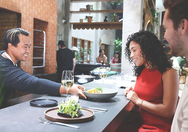 couple being served at the bar at Fortuna's Row