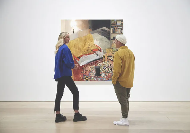 couple views an art piece at Esker Foundation
