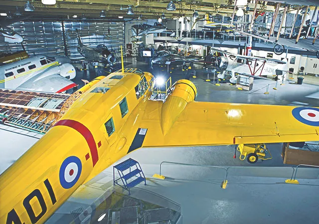 interior of the Hangar Flight museum featuring various airplanes